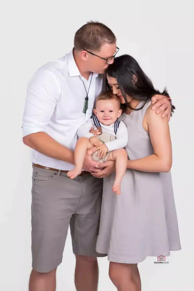 Smiling family enjoying a portrait session in Wellington